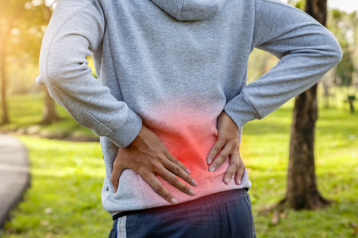 Lower back and sacroiliac joint pain in axial SpA (AS)